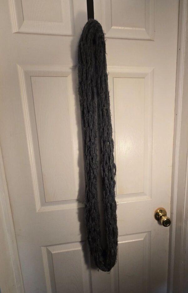 A door with a long chain hanging on it