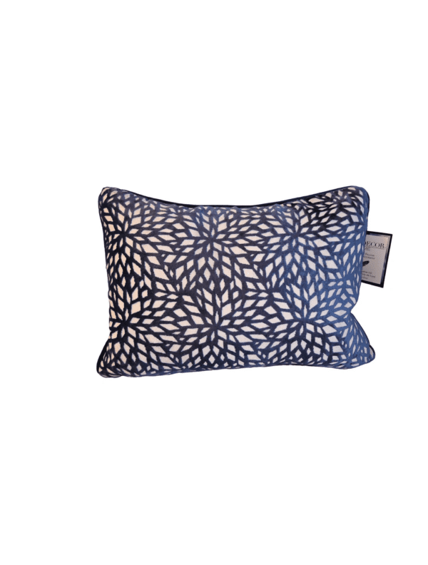 A pillow with a floral pattern on it.