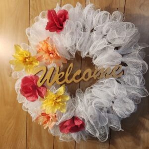 A wreath that has flowers on it.
