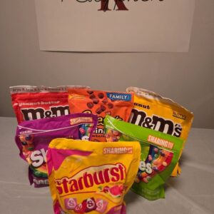 A table with several different types of snacks.