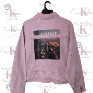 A pink sweater with the word upgrade on it.