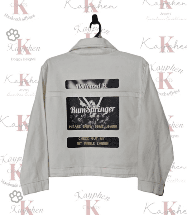 A jacket with patches on the back of it.