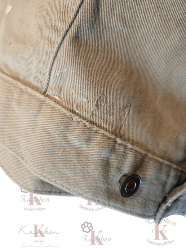 A close up of the button on a jacket