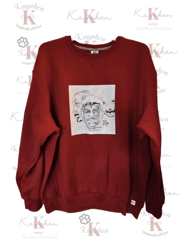 A red sweatshirt with an image of a person on it.