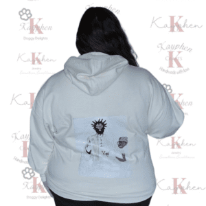 A woman wearing a white hoodie with an image of a person on it.