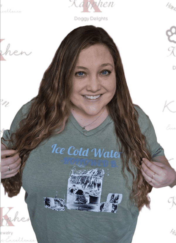 A woman with long hair and wearing a t-shirt.