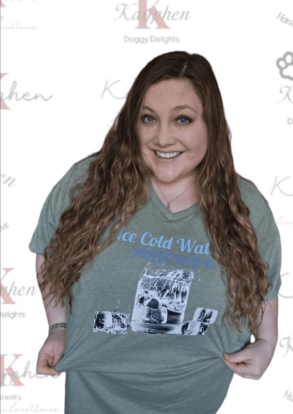 A woman with long hair wearing a t-shirt.