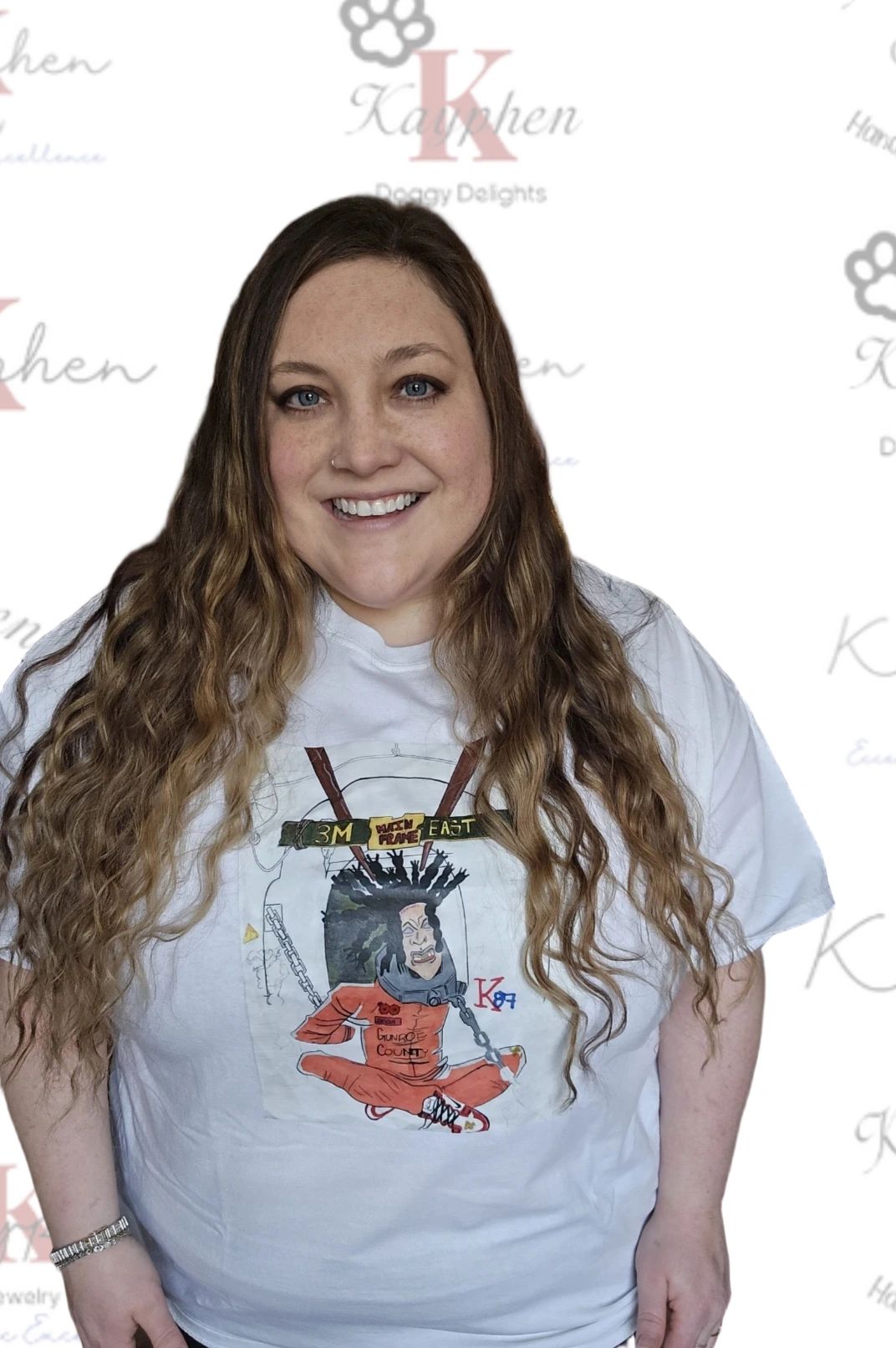 A woman with long hair wearing a t-shirt.