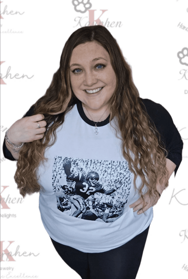 A woman wearing a black and white shirt