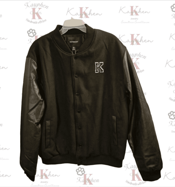 A black jacket with leather sleeves and a k logo.