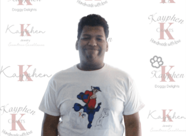 A man wearing a t-shirt with an image of a dog.
