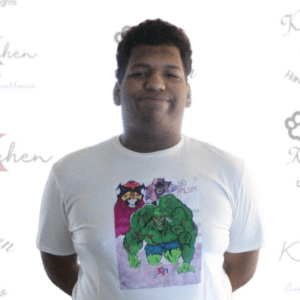 A man wearing a t-shirt with hulk on it.