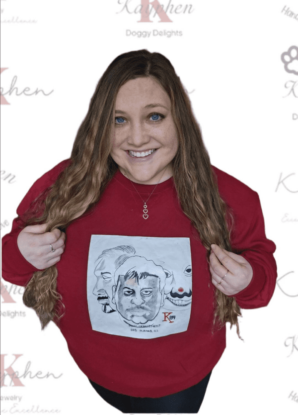 A woman with long hair and a red sweatshirt.
