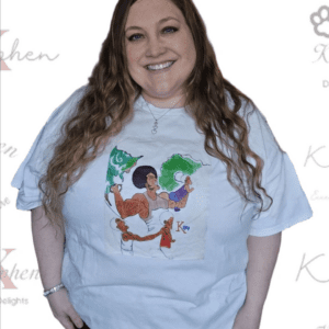 A woman wearing a white t-shirt with an image of a person and cat.