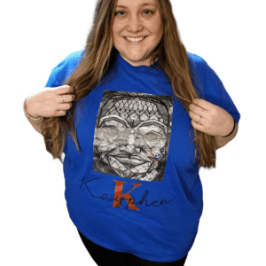 A woman holding onto the front of her t-shirt