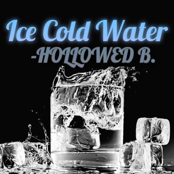 A glass of ice cold water with ice cubes.