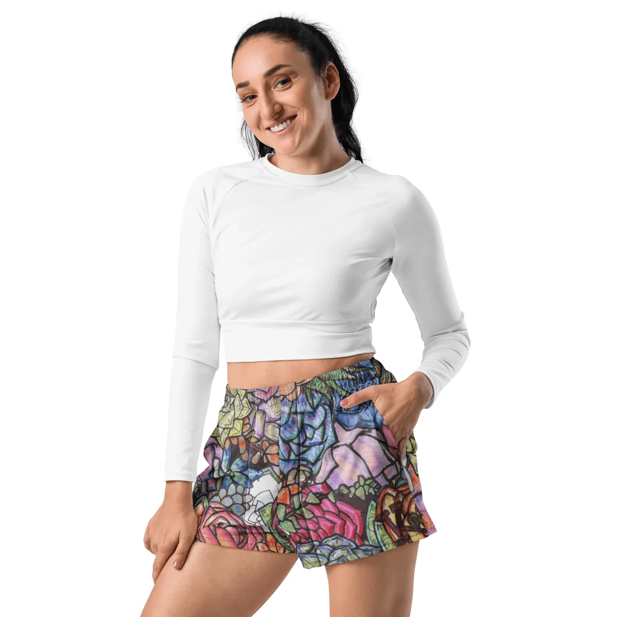 A woman wearing white shirt and shorts